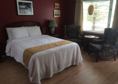 hotel room with queen bed