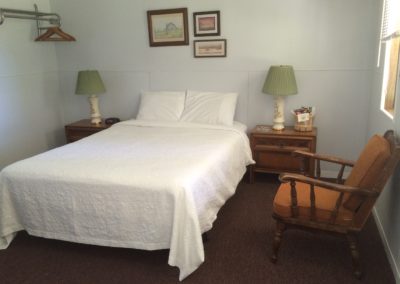 hotel room with queen bed