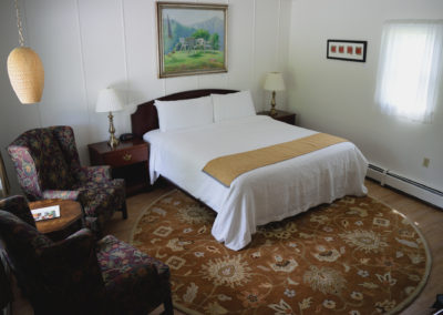 hotel room with king bed