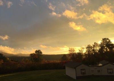 Sunset behind cottages 1
